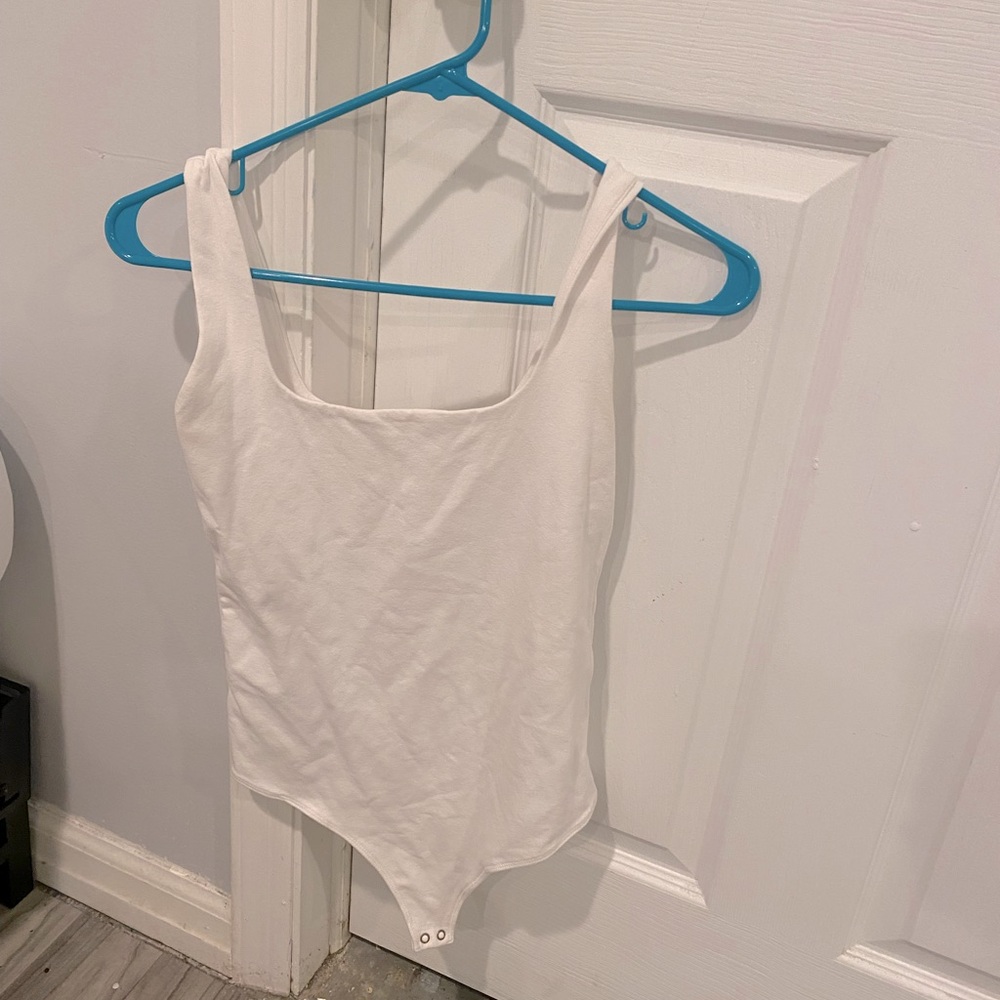 Woman’s size medium white bodysuit tank top strap from Abercrombie and Fitch